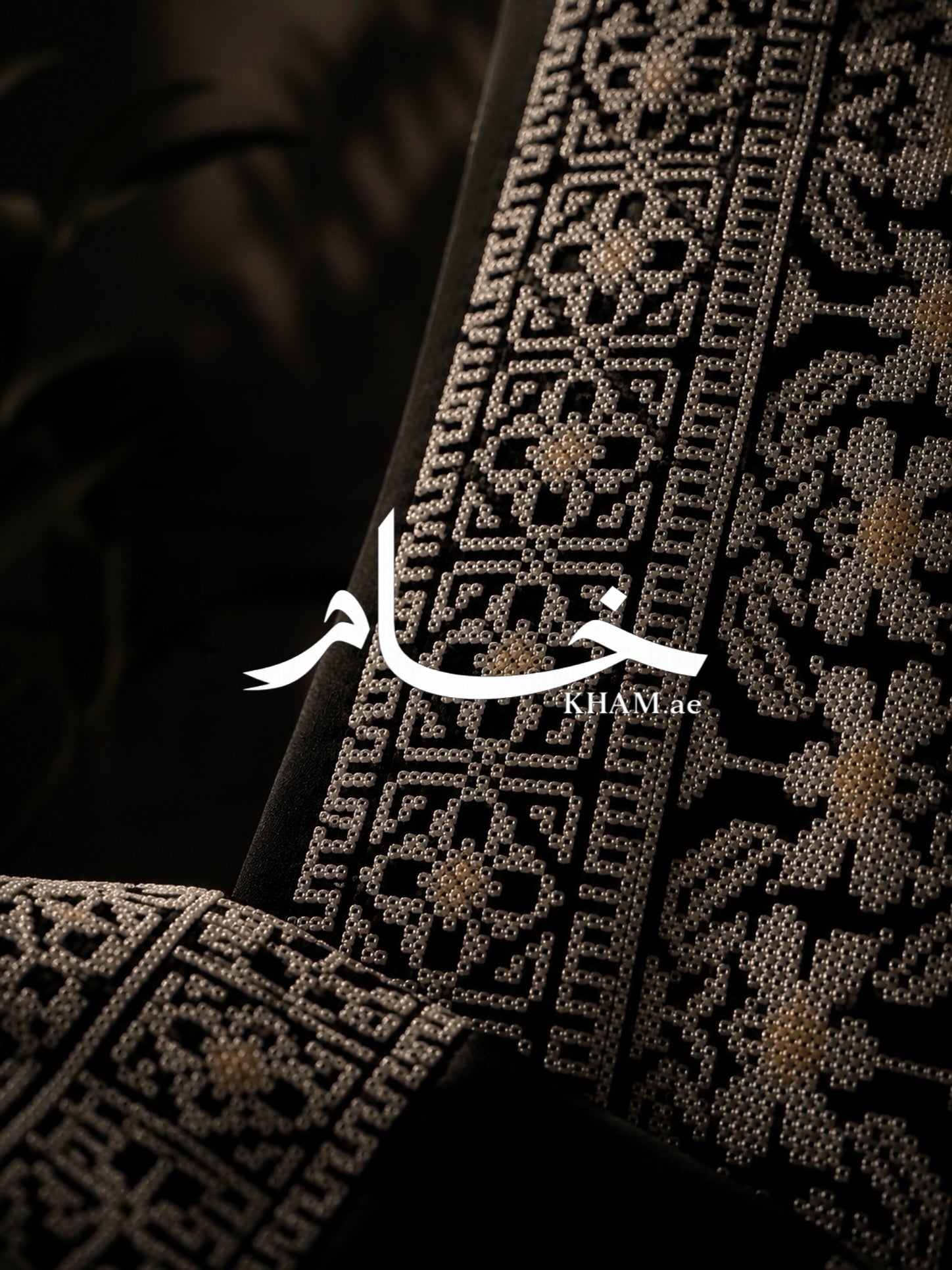 KHAM embroidery detail - threads woven with precision